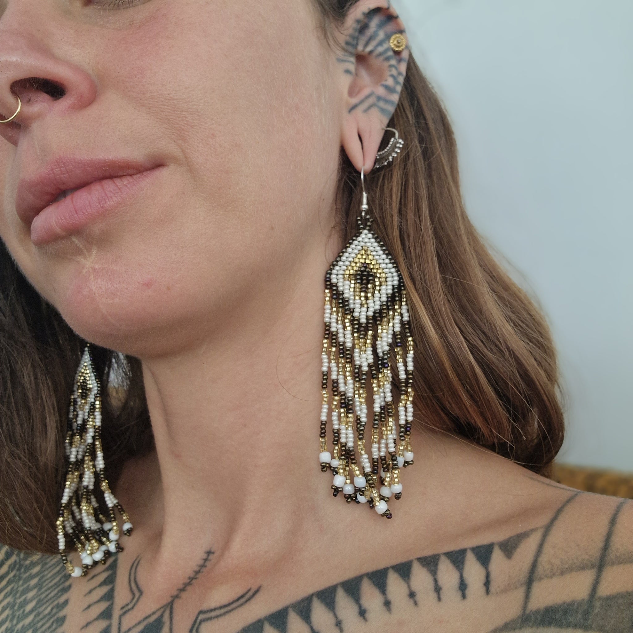 Golden feather earrings