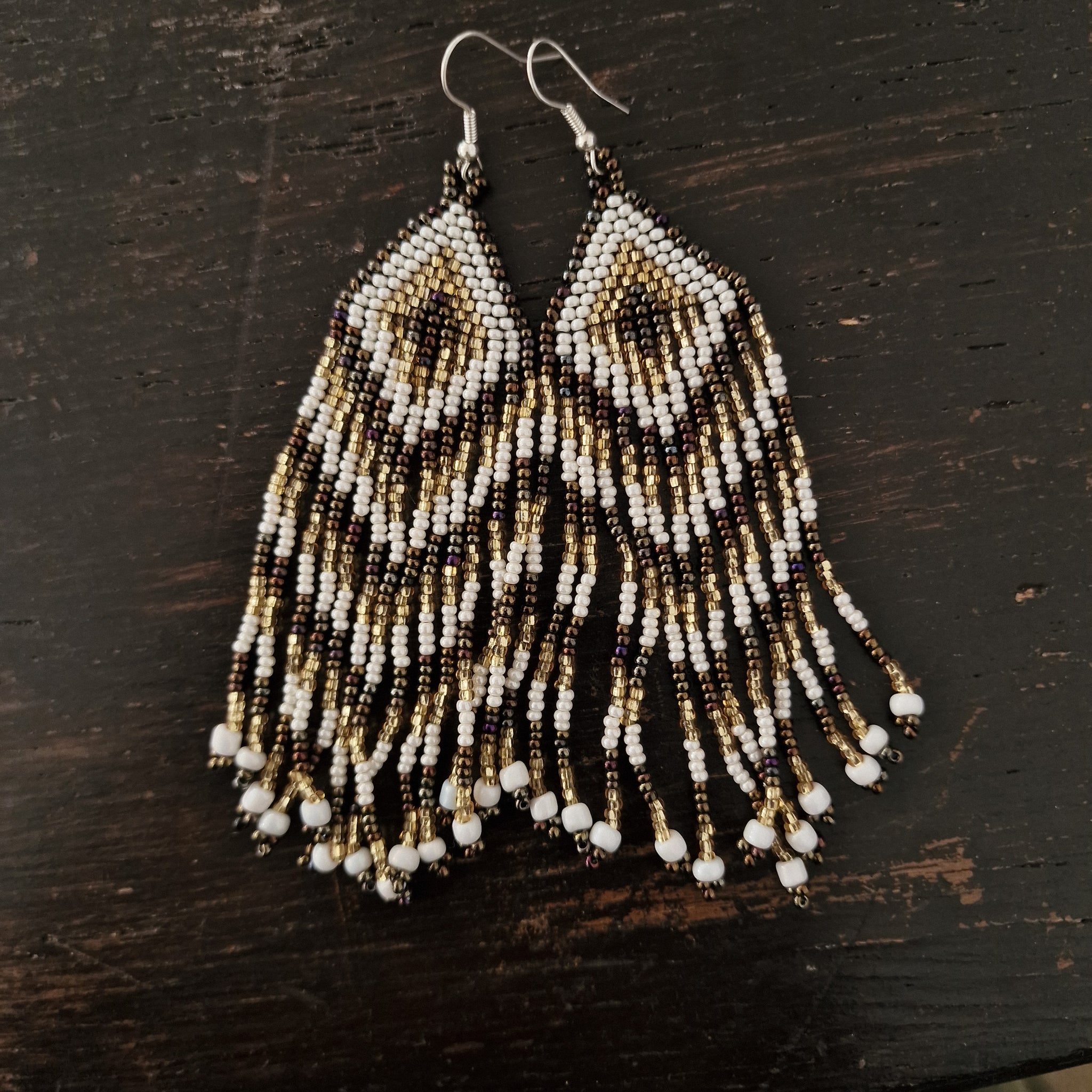 Golden feather earrings